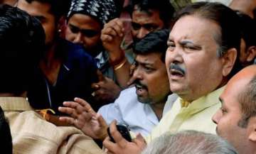 madan mitra brought to alipore court amid statewide protest by trinamool congress