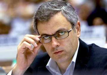 contradicting stand on article 370 will sink bjp s boat in jk omar