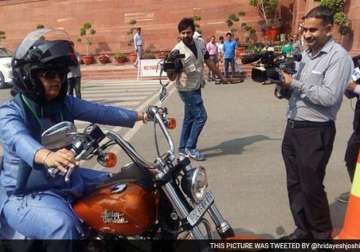 on women s day congress mp ranjeet ranjan rides harley davidson to reach parliament