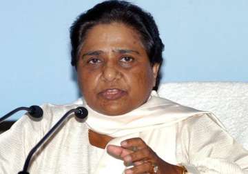 bjp rss spreading communal disharmony mayawati