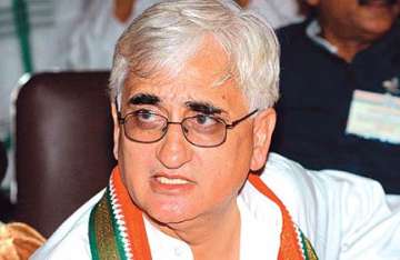 khurshid says sonia holds real power though pm in charge