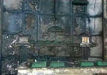 mps condemn burning down of church in delhi