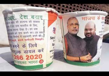 cups with pic of amit shah modi used in shatabdi railways ordered probe