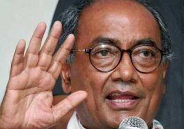 digvijay singh takes a dig at modi asks if he would take obama s advice