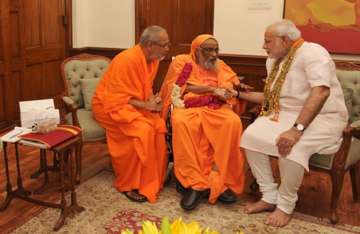 pm modi mourns death of swami dayananda saraswati