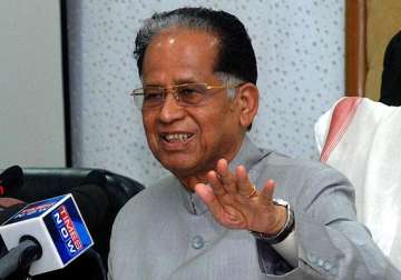 tarun gogoi opposes move to scrap plan panel