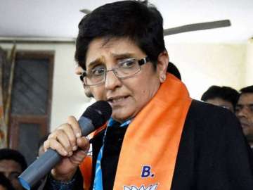 delhi polls aap charges model code violation by bedi complains to ec