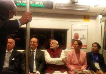 eco friendly push modi hollande take a metro ride to gurgaon