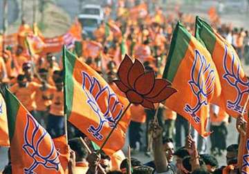 bjp ropes in mps mlas to become world s largest party