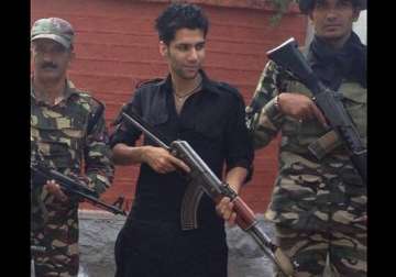 watch nc leader nasir aslam wani s son brandishing ak 47 gun in srinagar