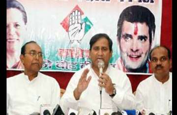 congress rejects as absurd bjp demand for tharoor sack