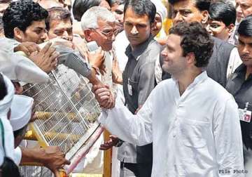 rahul gandhi on padyatra meets and comforts distressed farmers