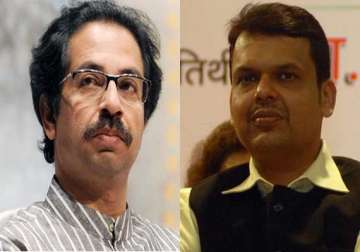 devendra fadnavis meets uddhav announces memorial to bal thackeray