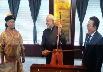 pm modi plays mongolian fiddle strikes new chord in ties