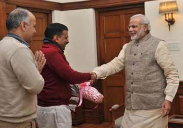 pm modi to skip arvind kejriwal s swearing in