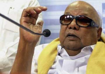 rein in hindutva forces karunanidhi to pm raises governance day issue