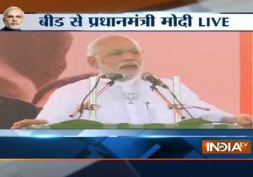 maharashtra polls what have you done in 60 years modi asks sonia at beed rally