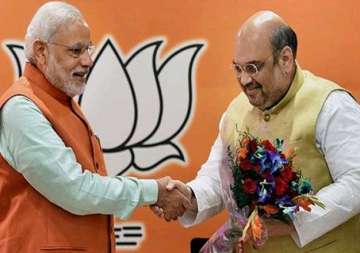 pm modi amit shah host dinner for bjp mps from up