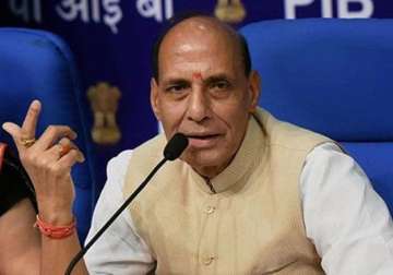 congress bjp clash over rajnath s hindu terrorism remarks