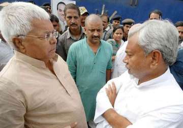 nitish should act against crime rjd jdu spar over law and order