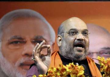 amit shah slams nitish over bribery video dares to name other ministers involved