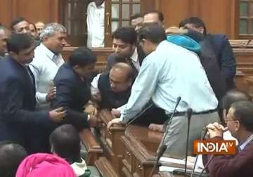 bjp mla vijender gupta carried out of delhi assembly by marshals