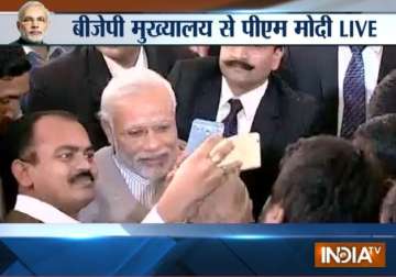 pm modi interacts with journalists at bjp office
