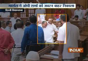 bjp mla evicted from delhi assembly on first day of budget session