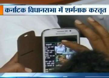 bjp mla caught zooming into priyanka gandhi s image inside karnataka assembly