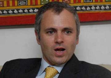 rs elections in j k omar slams bjp pdp alliance