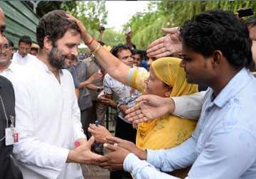 rahul gandhi meets sanitation workers for the second day