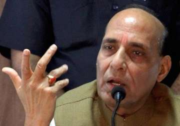 i m not in favour of putting up godse statues says rajnath singh