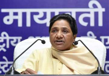 bjp plans to impose old class system alleges mayawati