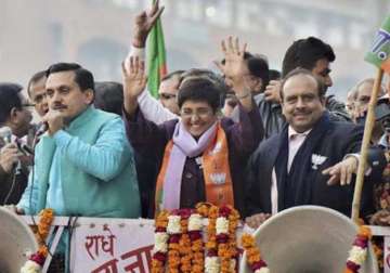 delhi polls war of words intensifies as bedi calls kejriwal bhagoda