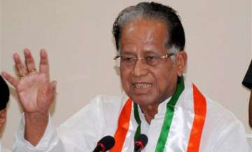 gogoi congratulates manmohan singh on getting japan s award