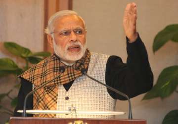 break silos get cracking to deliver results pm modi to babus