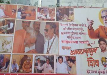 shiv sena removes poster showing pm modi bowing to bal thackeray