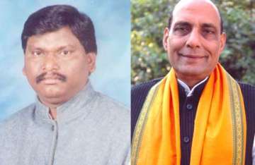 rajnath munda linked to koda scam says cong