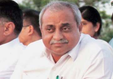 gujarat minister shown black flags by congress workers
