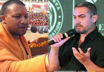 leaving country will at least reduce population adityanath on aamir s remarks