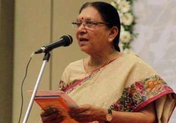 gujarat cm hails budget as pro people cong calls it jugglery