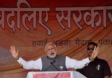 in 84 seconds pm modi reminds lalu nitish of their 33 scams