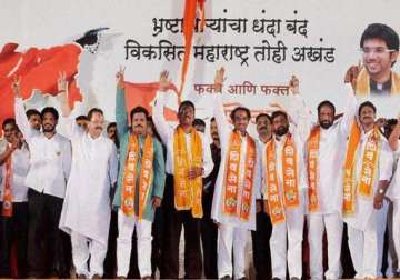 shiv sena slams bjp dubs congress ncp as dead snakes