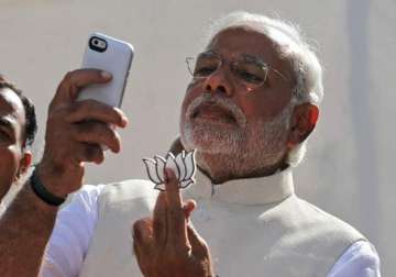 court dismisses plea against modi in poll code breach case