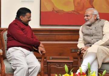 kejriwal meets pm modi complains against delhi police