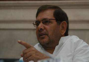 sharad yadav says merger is a done deal