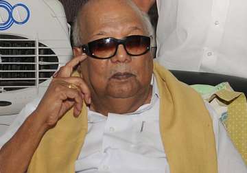 karunanidhi joins issue with jaya on food security bill