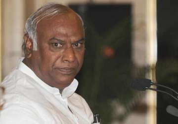 kharge questions sudden hike in rail fares