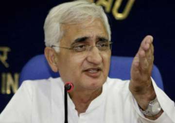 khurshid urges cong workers to highlight food land bills