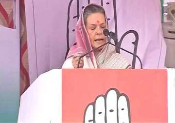 live sonia hits out at bjp says it is neck deep in corruption